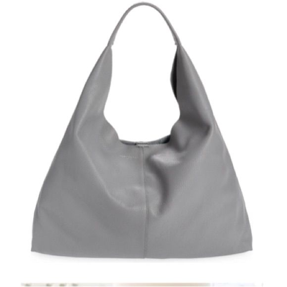 Product Description A Pebbled-Leather Hobo Bag Accommodates All Your Essentials With Room To Spare. 19 1/4”W X 13 1/4”H X 4 1/2”D Lined Leather Imported Item #7146765 Chic Hobo Bag With Smooth Grain For Shopping, Chic Smooth Grain Hobo Bag For Shopping, Chic Textured Leather Bag, Chic Leather Hobo Bag With Leather Lining, Chic Textured Leather Tote Bag, Versatile Hobo Bag With Leather Lining For Shopping, Modern Soft Leather Hobo Bag, Versatile Textured Leather Bucket Bag For Shopping, Classic Soft Leather Hobo Bag For Shopping