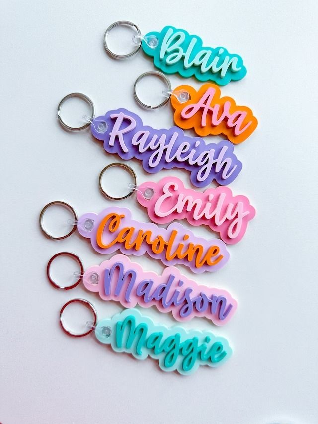 the name keychains have been made with acrylic and are multicolored