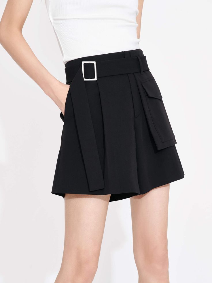 MO&Co. Women's Tailored Pleated Shorts with Belt in Black High Waist Shorts With Side Pockets For Work, Spring High Waist Shorts With Belt Detail, Belted Short Length Spring Bottoms, Chic Belted Short Bottoms, Belted Black Shorts, Chic Short Bottoms With Belt Detail, Chic Wide Leg Shorts With Belt Loops, Fitted Belted High-waisted Shorts, High Waist Shorts With Side Pockets