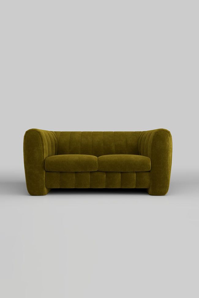 Bring a hint of the great outdoors to your indoor space with this beautiful moss-green sofa. It’s all soft velvet and undulating curves for the ultimate lounging experience, and is the perfect shape for making you feel thoroughly cocooned as you relax into your downtime. A bold piece that creates the perfect focal point in your living room, style with cushions in muted tones to create a calm, cool Scandi vibe, or go to the other extreme and indulge your inner maximalist with bright pink or orange accessories to really make things go pop. An hour spent on this stunning sofa is the ultimate tactile experience – it's just made for movie night!  - The Bowie Medium Sofa In Luxe Needlecord Velvet Vintage Green - Measures: H80cm x W176cm X D105cm Here's what makes our sofas unique... - Our 10-Yea Orange Accessories, Rockett St George, Green Sofa, Muted Tones, Room Style, Green Tones, Living Room Style, Vintage Velvet, Moss Green