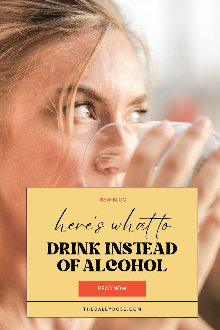 a woman drinking from a glass with the words here's what to drink instead of alcohol