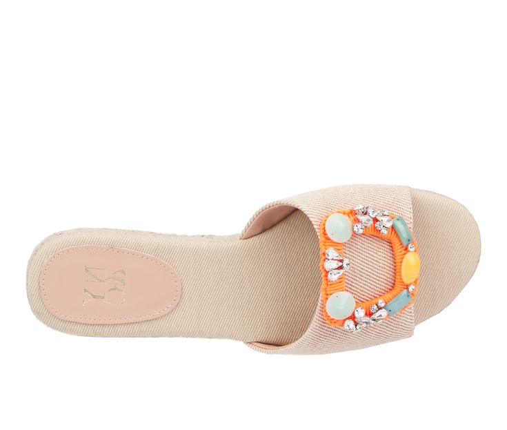 Sparkling rhinestones add a pop of color to the Tao, our canvas espadrille sandal. The slide silhouette brings ease of wear from brunch to the beach. Canvas upper, Slip on for easy entry,2\ espadrille platform sole, Almond open toe, Canvas lined footbed, Rubber outsole, Yarn wrapped brooch with rhinestone and bead details | Women's New York and Company Tao Sandals in Natural Size 6 Summer Textile Sandals For Vacation, Textile Beach Sandals For Summer, Adjustable Textile Beach Sandals, Spring Beach Sandals With Textile Material, Spring Beach Sandals In Textile, Textile Round Toe Sandals For Summer, Textile Summer Sandals For Spring, Summer Textile Sandals For Spring, Summer Canvas Sandals For Beach