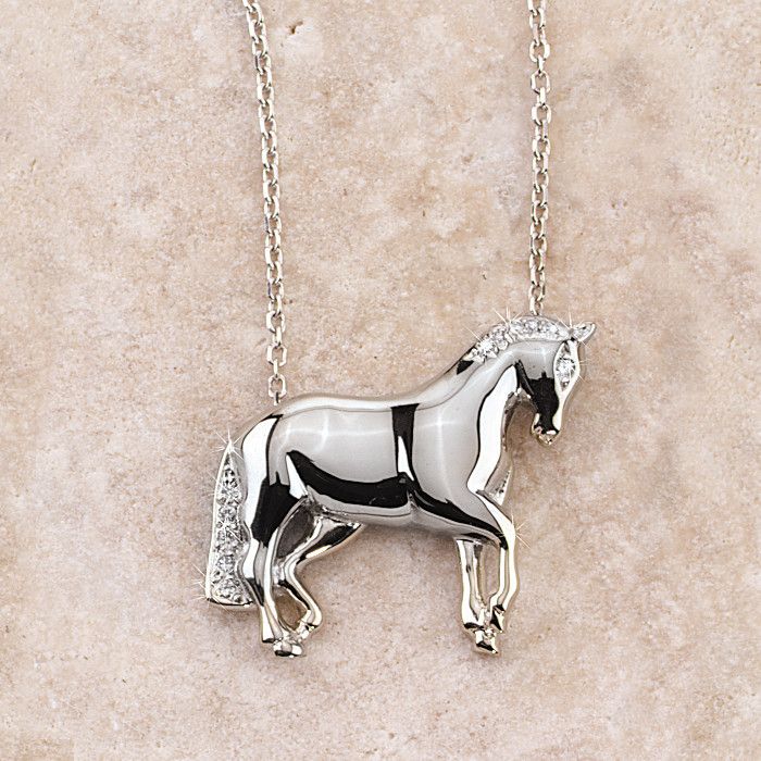 Ashley's 14k white gold Dressage Horse Necklace is hand made and hand finished for superior quality in the USA by Ashley's. Made of solid 14k white gold with .8ct diamonds and 16" diamond cut cable chain. This item is currently OUT of Stock. Please call for delivery schedule. Equine Jewelry, Horse Collection, Horse Art Drawing, Horseshoe Necklace, Equestrian Jewelry, Horse Necklace, Dressage Horses, Horse Jewelry, Horse Head