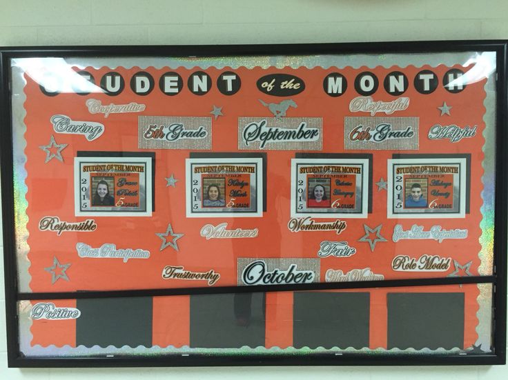 an orange and black bulletin board with the words student of the month written on it