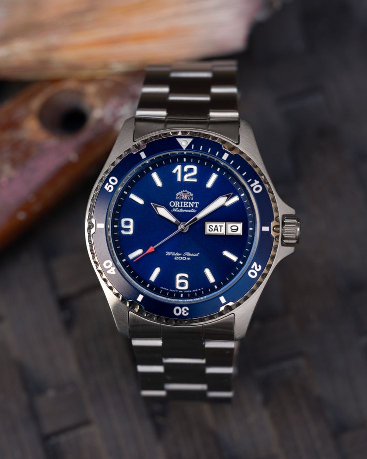 The watch that launched a thousand collections; explore what makes the Orient FAA02002D9 the premier dive watch for new collectors. Orient Watch, Diver Watch, Blue Cases, The Watch, Bracelet Clasps, Dive Watches, Mechanical Watch, Steel Bracelet, Diver