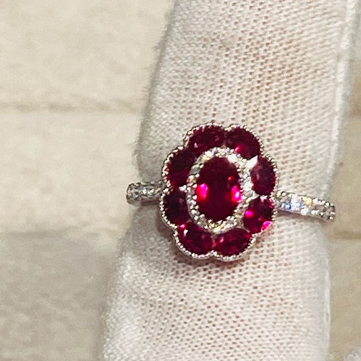 a close up of a ring on a napkin