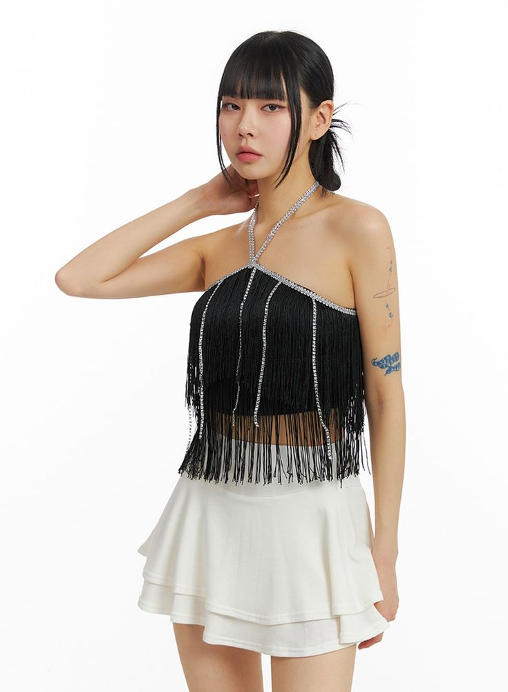 Product Detail Shop our latest women's fashion piece, designed for the party wear or festival occasions. This sexy fringe detail top offers a slim fit for a stylish look. Style : Sexy Occasion : Party wear, Festival Detail : Fringe Material : Polyester Sleeve : Sleeveless Neck : Halter neck Length : Crop Fit : Slim fit Polyester100 Color : Black, White Model Size Model is wearing size S/M and the color Black. Height : 5'6" | 167cm / Top : S / Bottom : S (26 inch) .prddescription table, .prddescr Festival Trends, Boatneck Sweater, Beige Top, Halter Crop Top, Shrug Sweater, Prom Outfits, Fashion Korean, Korean Street Fashion, Kpop Fashion