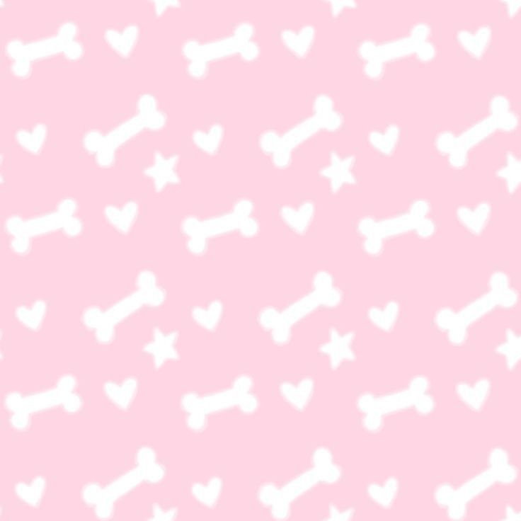 a pink background with white dog bones and hearts