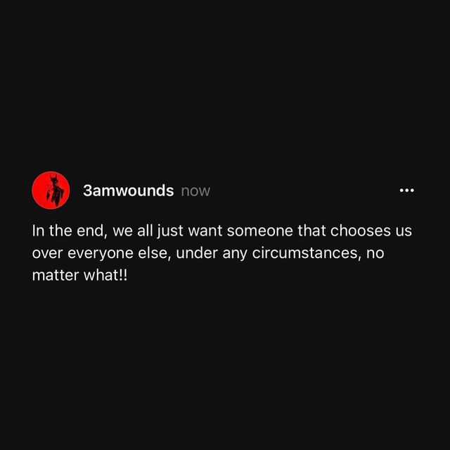 a black background with a red circle and some words in the bottom right hand corner