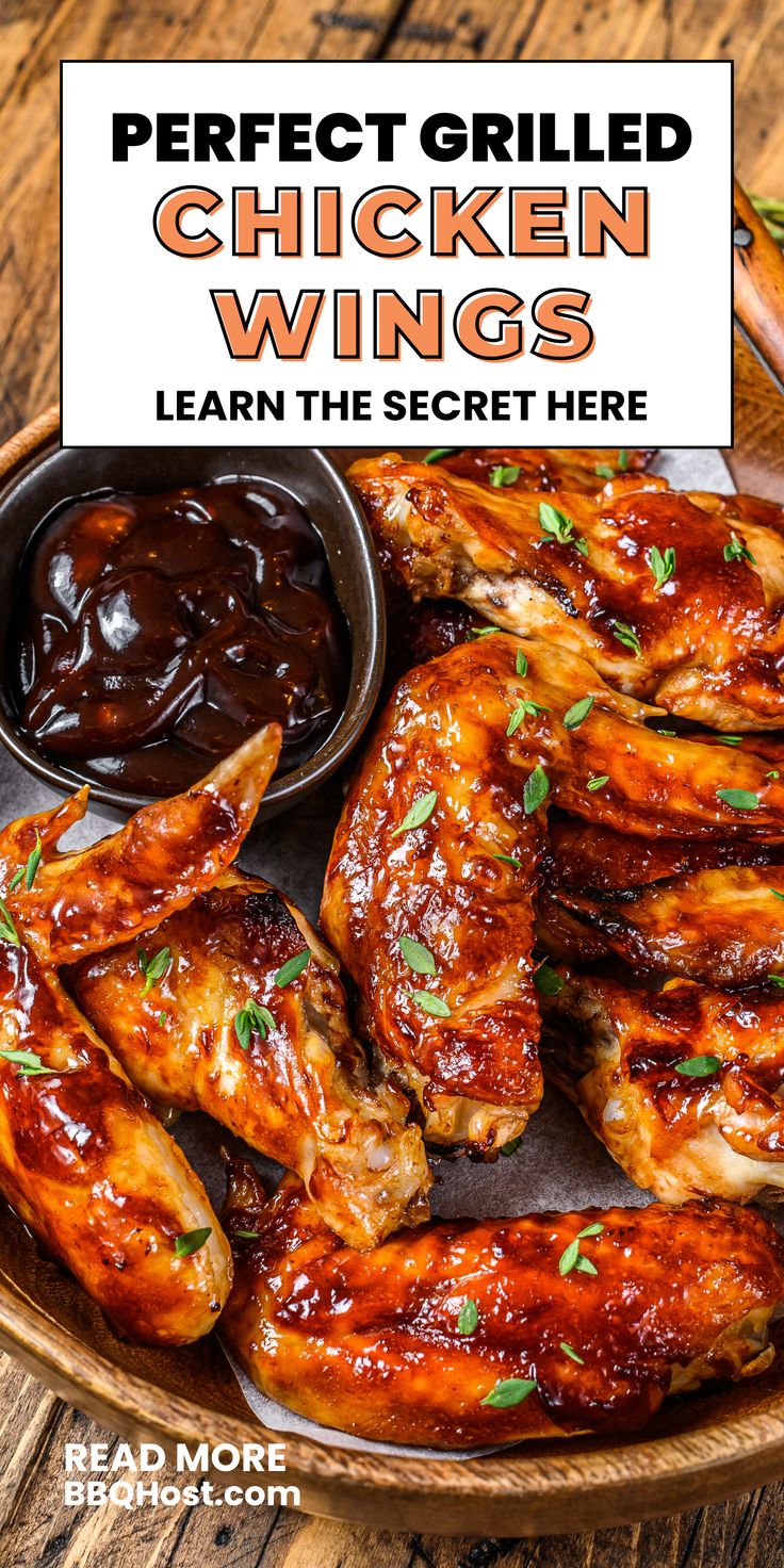 grilled chicken wings with bbq sauce on the side and text overlay that reads, perfect grilled chicken wings learn the secret here