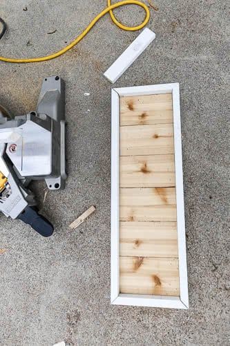 the tools are laying on the ground next to the wood planks that have been cut in half