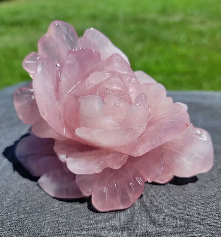 Stunning deep pink Rose Quartz Crystal Rose Carving with intricate details Approximately 5.62" wide  Approximately 3.5" tall Approximately 4.13" deep 1lb 13.2oz or 827g Polished finish Rose Quartz is often associated with love, compassion, and matters of the heart. It's considered a symbol of unconditional love and is believed to open the heart to both giving and receiving love. It's often used to enhance relationships, promote self-love, and encourage empathy and emotional healing. Due to its a Rose Quartz Aesthetic, Aphrodite Altar, Lady Aphrodite, Valentine Aesthetic, Rose Carving, Receiving Love, Aesthetic Rose, Matters Of The Heart, New Bern