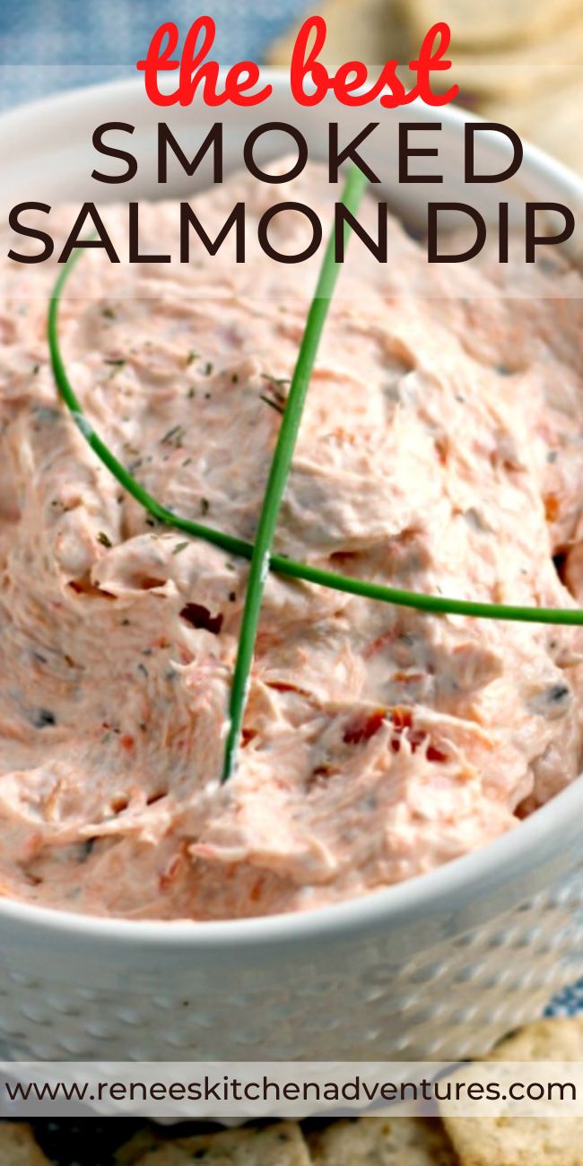 the best smoked salmon dip in a white bowl with crackers around it and text overlay