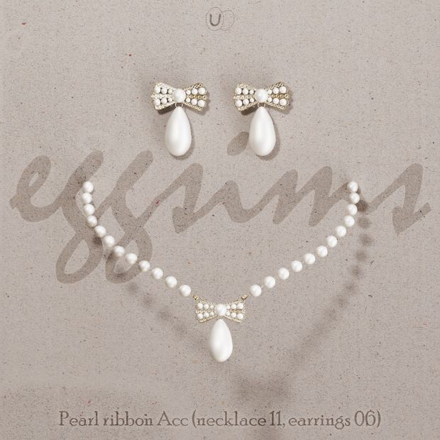 the pearl necklace and earring are adorned with bows