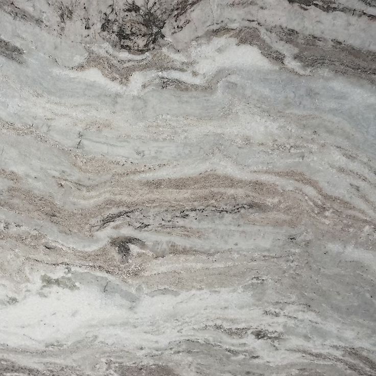 a marble counter top with grey and white colors