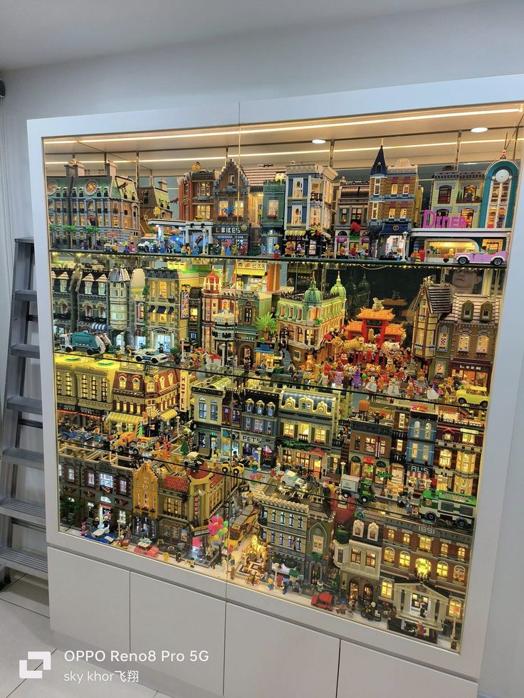 a large display case filled with lots of toy buildings