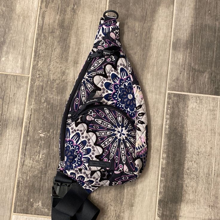 Beautiful Floral Mini Sling Back Pack, Never Worn! New Without Tags. Dimensions: 7.0" W X 13.5" H X 2.5" D With 32.5" Adjustable Strap And 10.5" Adjustable Strap Purple Backpack With Zipper For On-the-go, Purple Backpack With Zipper Closure For On-the-go, Purple Shoulder Backpack For Daily Use, Casual Purple Backpack For Daily Use, Purple Backpack With Removable Pouch For Daily Use, Functional Purple Bag With Adjustable Strap, Purple Backpack For Everyday Use, Purple Backpack With Zipper Closure, Trendy Purple Shoulder Bag With Cell Phone Pocket