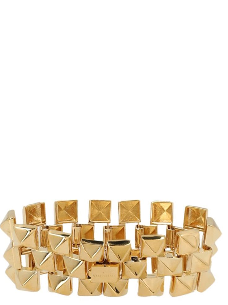 Studded bracelet in gold metal. Composition: Designer Gold Jewelry With Gold-tone Hardware, Designer Gold Bracelets With Gold-tone Hardware, Gold Cuff Bracelet Jubilee Style For Formal Occasions, Gold Cuff Bracelet With Jubilee Detail For Formal Events, Gold Cuff Bracelet With Jubilee Design For Formal Events, Designer Yellow Gold Jewelry With Gold-tone Hardware, Designer Gold-tone Metal Bracelets, Designer Gold Metal Chain Bracelet, Designer Gold Chain Bracelet