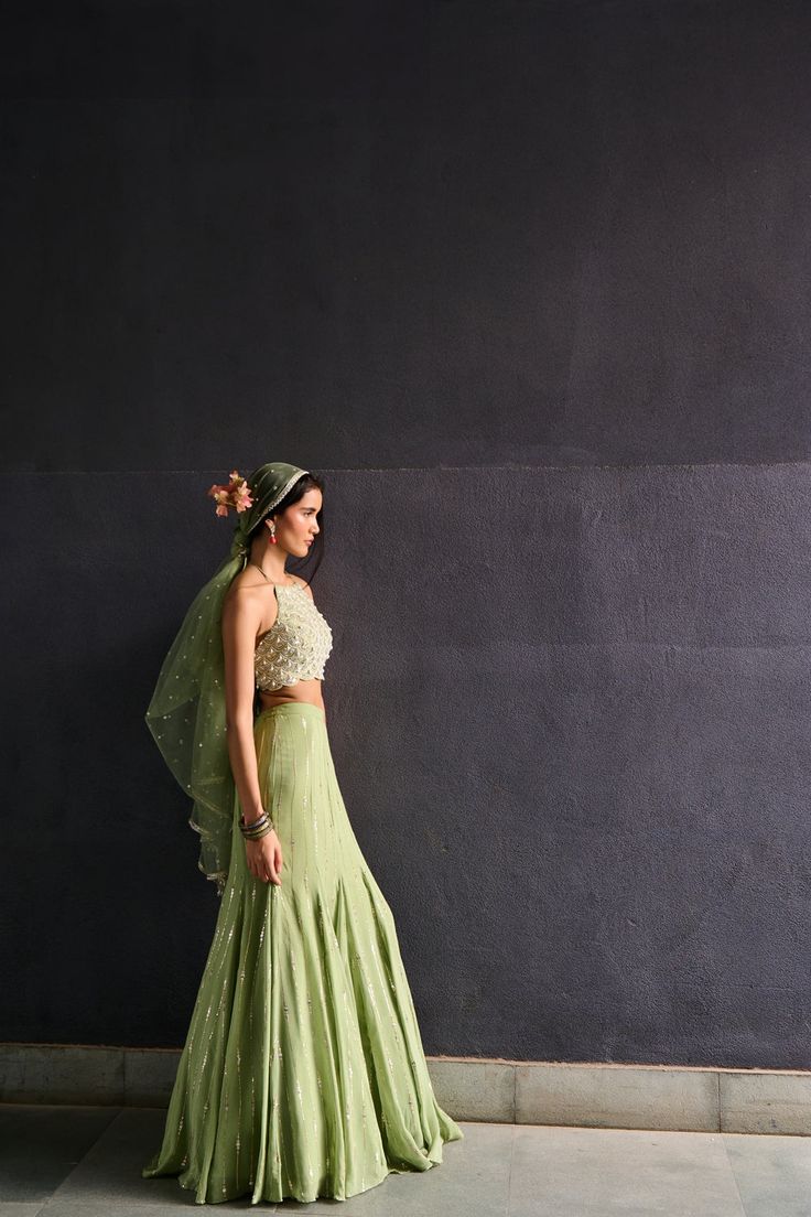 Summer Reception Green Lehenga, Green Sharara For Summer Weddings, Traditional Green Sharara For Evening, Summer Wedding Party Wear Sharara, Green Evening Sets With Dupatta, Evening Green Sets With Mirror Work, Pista Green Summer Wedding Dress, Summer Wedding Pista Green Sharara, Green Long Dresses For Wedding