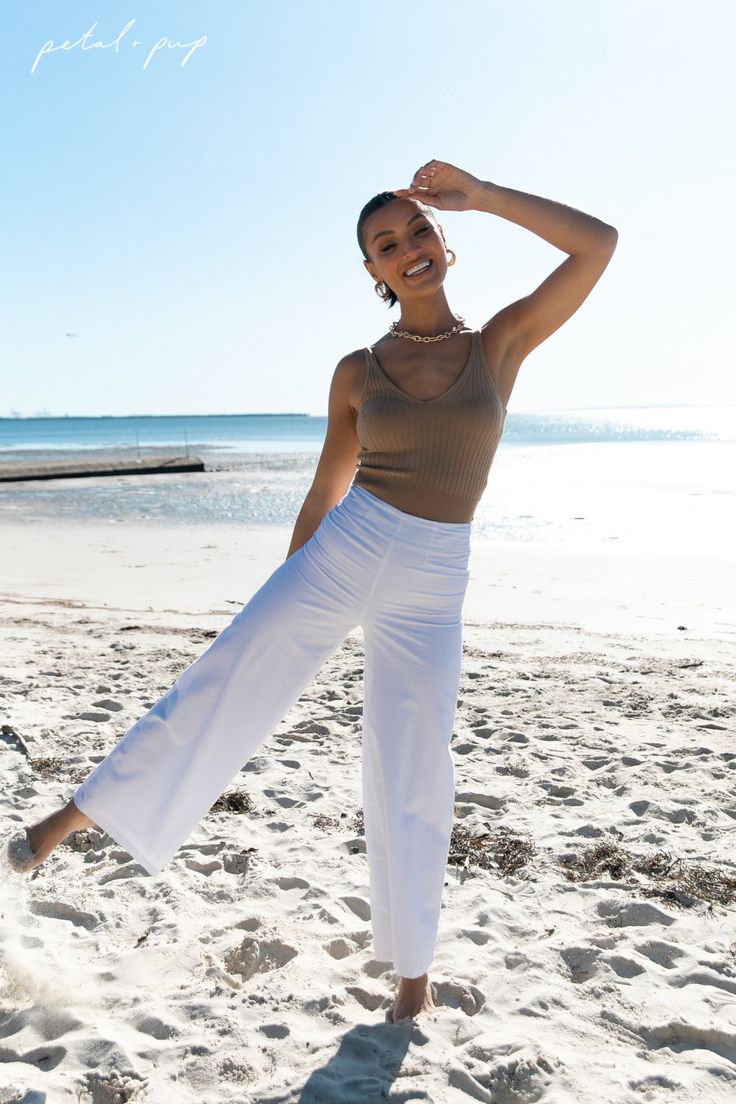 Step into spring with our Gemma V Neck Tank Top in Camel 🌼 Effortlessly chic and endlessly versatile, it's the perfect piece for those laid-back spring days. Tap to shop this casual spring outfit now! Winter Minimalist Outfit, Beachy Summer Outfits, Tank Top Outfit, Rib Sweater, Rib Stitch, Tank Top Outfits, V Neck Tank Top, Knit Tank Top, Sweater Tank