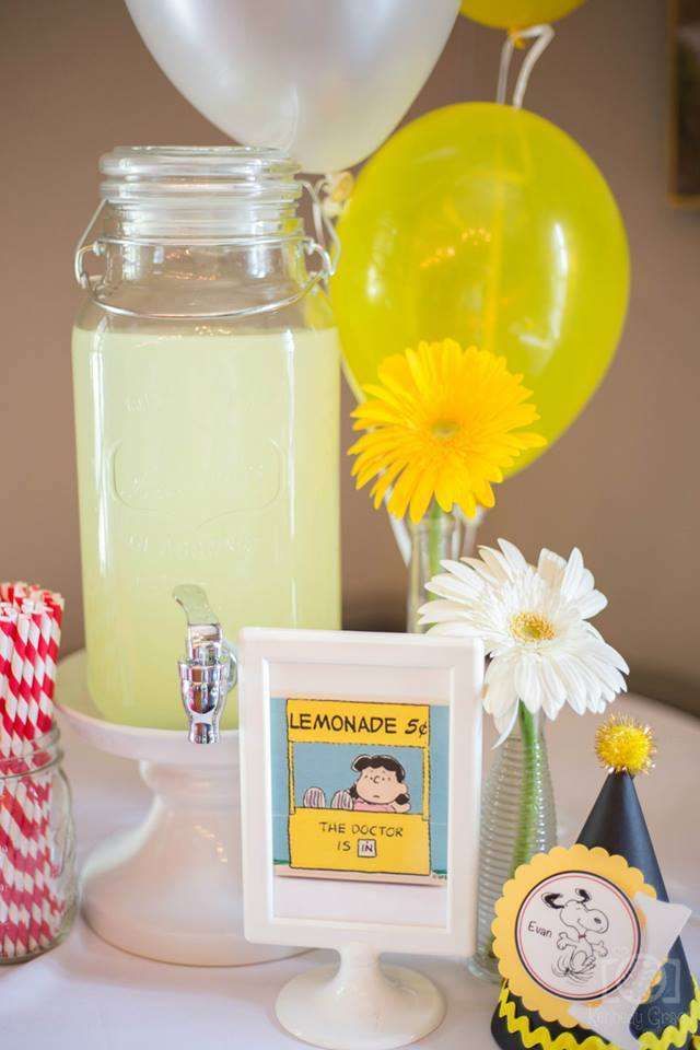 a table topped with balloons and other items