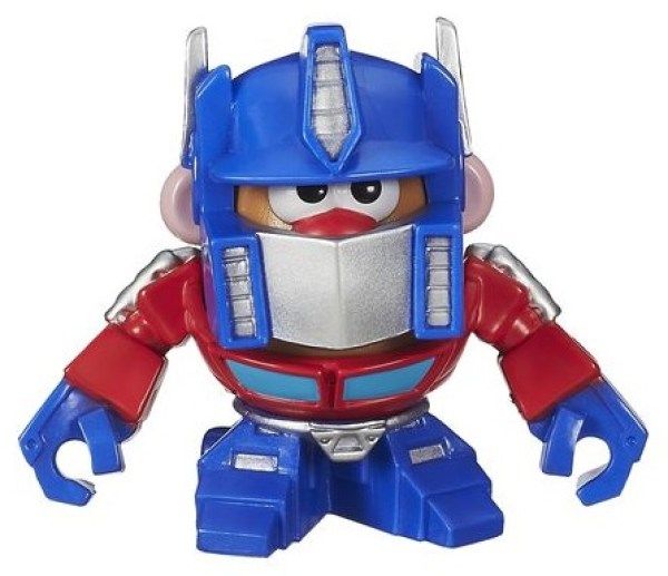 a blue and red robot toy with horns on it's head, standing in front of a white background