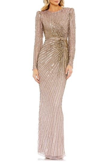 Shimmering sequins and brilliant beadwork direct the dazzle of this close-fitting sheath gown set with a pretty puff atop each sleeve. Jewel neck Long sleeves Lined, except sleeves 100% polyester Spot clean Imported Asian Owned/Founded Bronze Dress Formal, Luxury Fitted Sequin Mother Of The Bride Dress, Luxury Fitted Mother Of The Bride Dress With Sequins, Glamorous Embellished Mother Of The Bride Dress, Glamorous Mother Of The Bride Dress With Sequins, Baju Pengapit, Vestidos Color Coral, Sheath Gown, Stunning Style