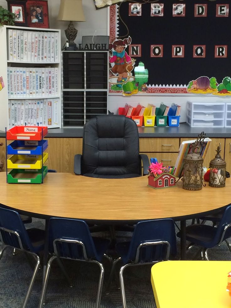 a classroom with desks and chairs in it