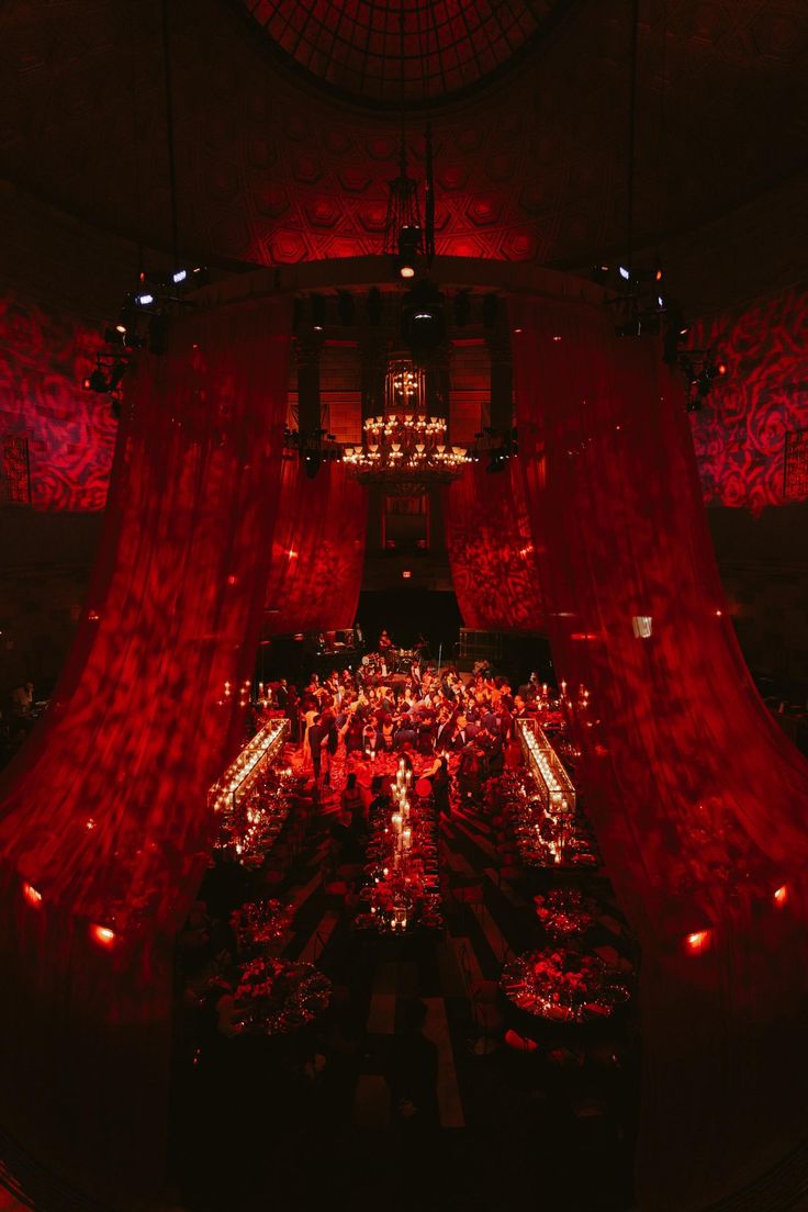 a large room filled with lots of red lights