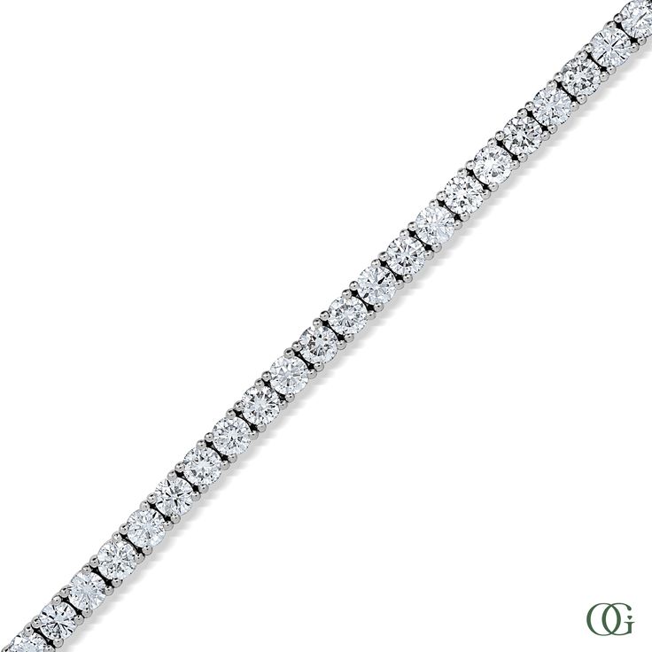 This Tennis Bracelet features an elegant round shape and a sparkling design. This bracelet is designed to be durable and long-lasting. The bracelet's unique sparkle makes it the perfect accessory for any occasion. The standard size is 7 inches; please note any other sizes are considered special order and may require additional time for production. Classic Sparkling Diamond Bracelet, Classic Sparkling Round Cut Jewelry, Classic Round Band Bracelet For Anniversary, White Gold Round Band Bracelet For Anniversary, White Gold Round Band Bracelets For Anniversary, Flexible Sterling Silver Round Bracelet, Classic Sparkling White Gold Bracelets, Classic Sparkling Jewelry Bracelet, Classic Flexible Tennis Bracelet