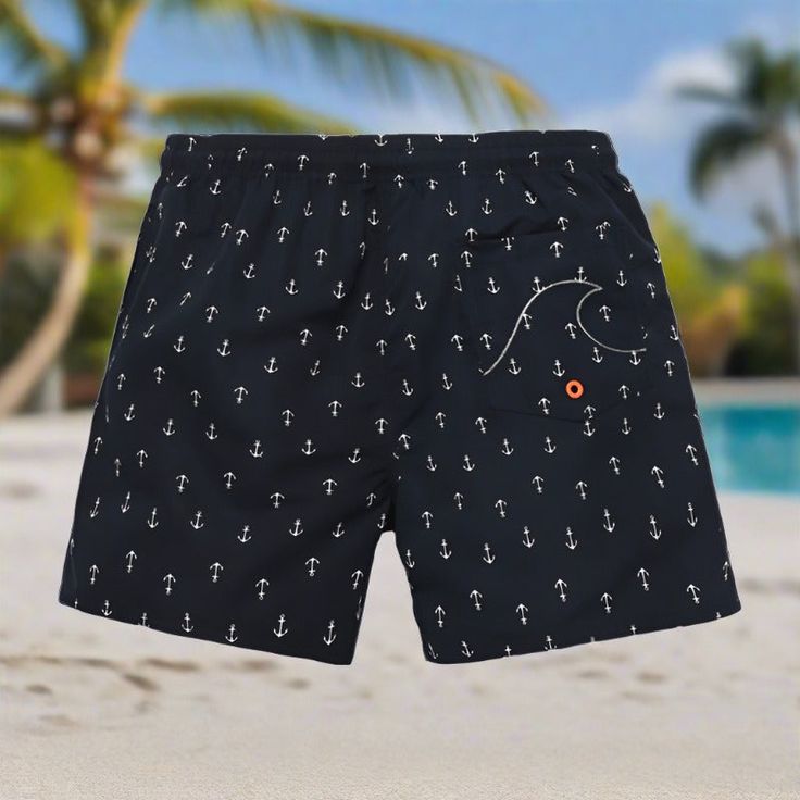 Dive into summer with our Ocean Glide Swim Trunks, perfect for aquatic adventures. Designed for wave riders and sunbathers, these swim trunks blend style and function. Crafted from quick-drying fabric with a comfortable elastic waistband, they offer maximum comfort both in and out of the water. Featuring a sleek design and vibrant ocean-inspired prints, our swim trunks make a bold statement wherever you go. Glide effortlessly from beach to boardwalk with our Ocean Glide Swim Trunks. Beachwear Swimwear With Built-in Shorts For Outdoor, Black Short Swim Trunks For Water Sports, Black Short Swim Trunks For Swimwear, Surfing Swim Trunks With Uv Protection, Beachwear Swim Trunks With Uv Protection For Surfing, Uv Protection Swim Trunks For Surfing, Casual Swim Trunks With Uv Protection For Beach Season, Beach Swimwear With Uv Protection, Short Style, Uv Protection Short Swim Trunks For Beach