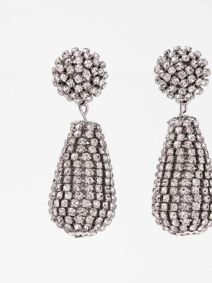 Expertly crafted, the Mila Drop Rhinestone Earrings add a touch of elegance to any outfit. With a delicate drop design and sparkling rhinestones, these earrings are perfect for any occasion. Their timeless beauty and subtle shine make them the perfect accessory for any fashion-forward individual. SizeH: 2.15"W: 0.75" QualityMade with quality materials for endurance. ImportedEY12699 Halo Design, Drop Design, Drops Design, Champagne Gold, Rhinestone Earrings, First They Came, Timeless Beauty, Gold Earrings, Silver Gold