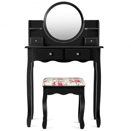 a black vanity with mirror and stool on top of the table is shown in front of a white background