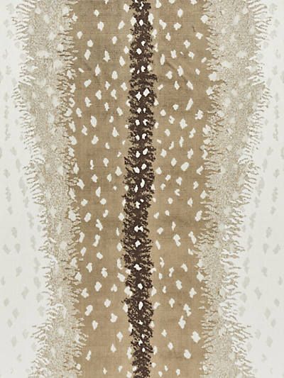 an abstract pattern with white and brown colors on a beige background that is slightly blurry