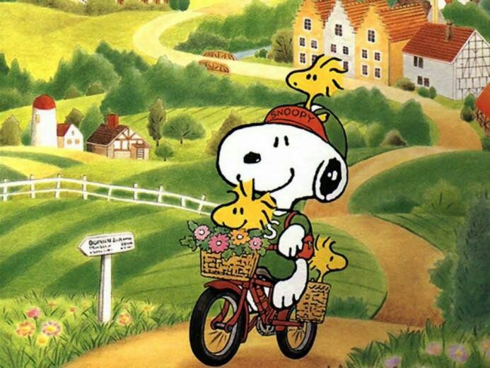 a painting of a snoopy riding a bike down a dirt road with houses in the background