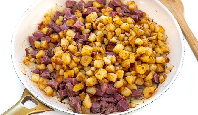 the food is prepared and ready to be cooked in the skillet on the stove