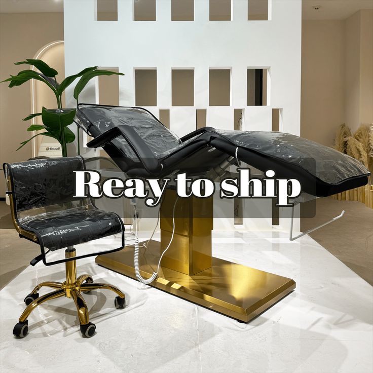 a chair and ottoman with the words ready to ship in front of it on a white floor