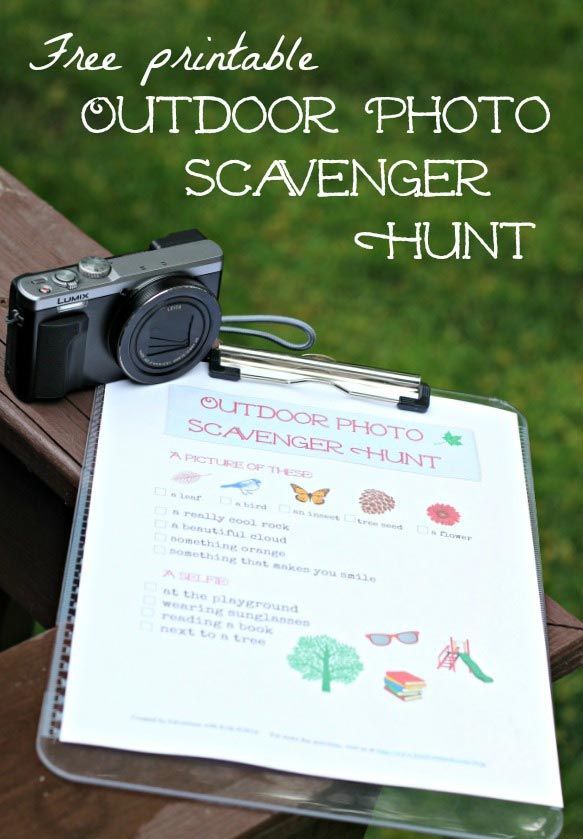 an outdoor photo scavenger hunt with a camera and clipboard attached to it