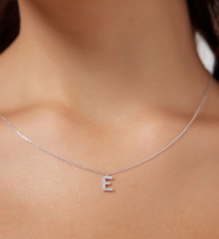 "14K SOLID WHITE GOLD DAINTY INITIAL NECKLACE WITH DIAMONDS Metal : 14K Solid Gold Necklace Length : 16 inches / 40cm Letter Height : 7.20mm Letter Width : 4.80mm Diamond : 14 Diamonds --- Nice White Color Sparkle Diamonds ---- G-H color SI2 clarity Total Carat: 0.08ct to 0.12cts (Depending on the letter) ---MADE IN USA--- ---All letters from A to Z are available. Please indicate your letter choice in the \"notes to seller\" section on the order. ---This is a beautiful 14K Solid White Gold Daint White Initial Pendant Necklace For Formal Occasions, Silver Dainty Initial Necklace For Formal Occasion, Silver Formal Initial Necklace, Silver Initial Pendant Diamond Necklace In 14k Gold, 14k Gold Silver Diamond Initial Pendant Necklace, Silver Diamond Initial Pendant Necklace In 14k Gold, Silver 14k Gold Initial Pendant Diamond Necklace, White Gold Initials Necklace In Fine Jewelry Style, White Diamond Initial Pendant Necklace As Gift