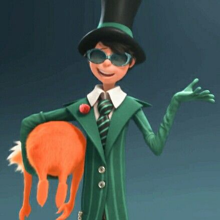 a man in a green suit and top hat holding an orange cat with his right hand