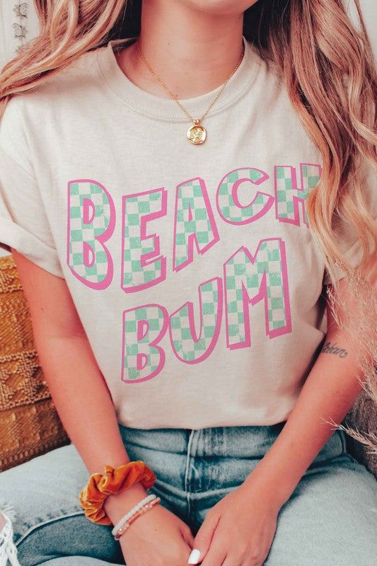 CHECKERED BEACH BUM GRAPHIC T-SHIRT** PLUS SIZE AVAILABLE: 10968X-TS-PLUS **- Premium 4.2 oz., 100% airlume combed and ringspun cotton- Retail fit- Unisex sizing- Shoulder taping- Sideseamed- Pre-shrunk* SUMMER, SUMMER TEE, SUMMER GRAPHIC, SUMMER OUTFIT, BEACH, OCEAN, SAND, SUN, SWIM, VACATION, TRAVEL, OUTDOOR, CAMPING Style: CASUAL Print / Pattern: CHECKERED BEACH BUM Silhouette: TEE Fit: UNISEX Neck Line: CREW Sleeve: SHORT Made In: USAFabric Contents: 100% COTTON Stretch fabric Non-sheer fabr White Graphic Print Shirt For Beach Party, Spring Beach Shirt With Text Print, Cotton T-shirt With Sublimation Print For Beach Season, Casual Cotton Shirt For Beach Party, White Graphic Tee For Beach Party, Fun White T-shirt For Beach Party, Cotton T-shirt For Beach Party In Spring, Cotton Letter Print Shirt For Beach Party, Casual Crew Neck Shirt For Beach Party