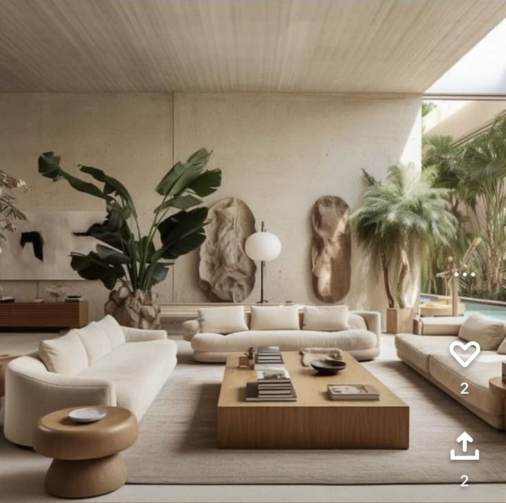 a living room filled with lots of furniture next to a swimming pool and palm trees