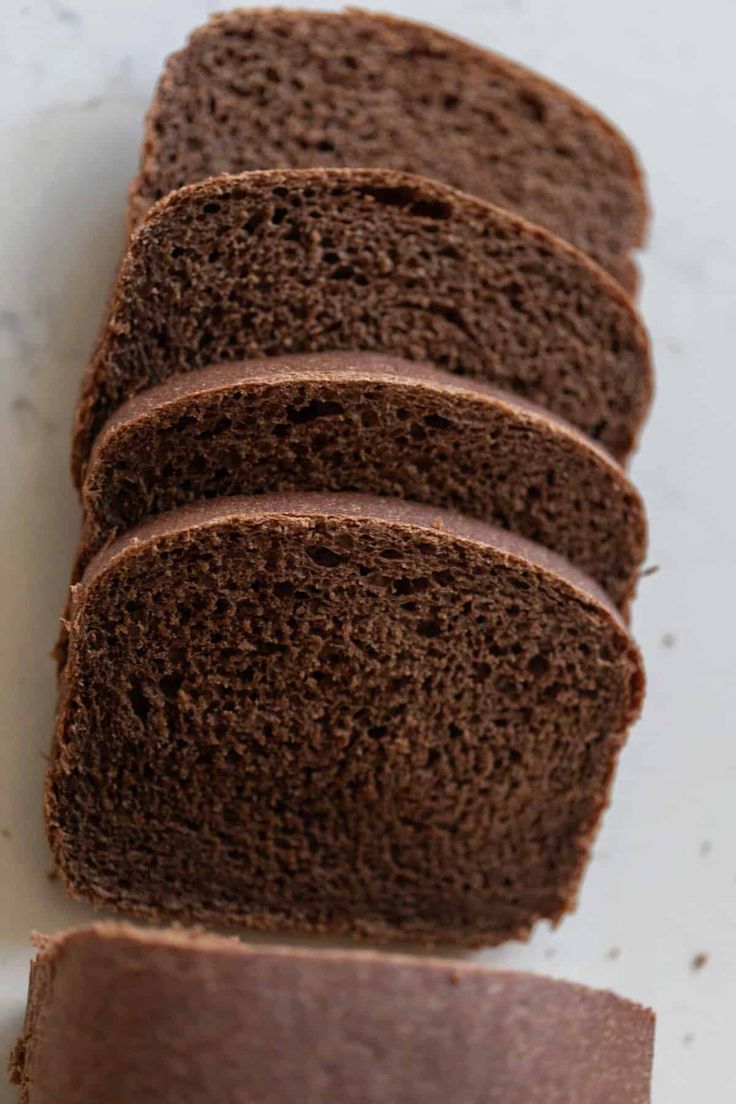 slices of chocolate bread on a white surface