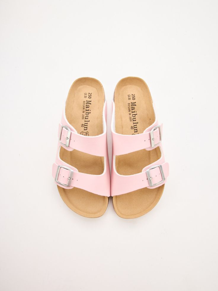 Introducing Maibulun's Signature Double Strap Footbed Sandal in Pink. Designed for ultimate comfort and style, these sandals feature a double strap design for secure support and a hard footbed for extra ankle support. Perfect for a day out or a casual stroll, elevate your look with these signature sandals. 0.59" inch heel Slip-on / buckle closure Hard Cushioned footbed Man-made leather upper Man-made lining EVA sole Double Strap Cushioned Footbed Sandals For Vacation, Cushioned Double Strap Footbed Sandals For Vacation, Double Strap Cushioned Footbed Sandals For Beach, Cushioned Double Strap Footbed Sandals For Beach, Summer Flat Clogs With Buckle Closure, Comfortable Pink Footbed Sandals With Textured Footbed, Comfortable Pink Footbed Sandals With Textured Sole, Comfortable Pink Textured Footbed Sandals, Pink Open Toe Footbed Sandals