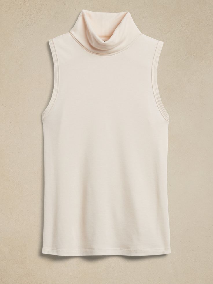 Adorno Turtleneck Tank | Banana Republic Chic Mock Neck Turtleneck Top For Layering, Chic Mock Neck Top For Layering, Chic High Neck Mock Top For Layering, Chic High Neck Tank Top For Fall, Chic Turtleneck Tops For Layering, Classic Mock Neck Top For Spring Layering, Classic Spring Mock Neck Top For Layering, Elegant Stretch Tank Top For Fall, Elegant Spring Turtleneck For Layering