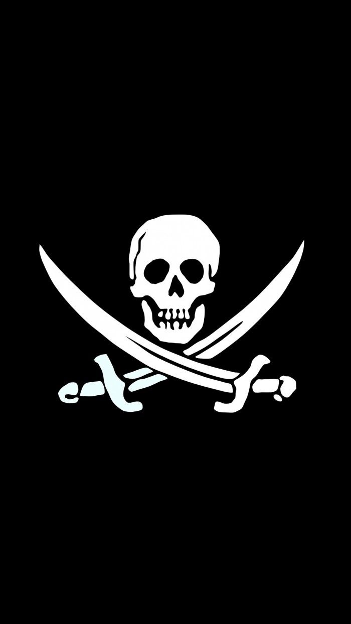 a pirate skull and two swords on a black background