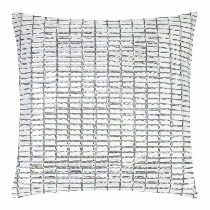 a white pillow with silver lines on it