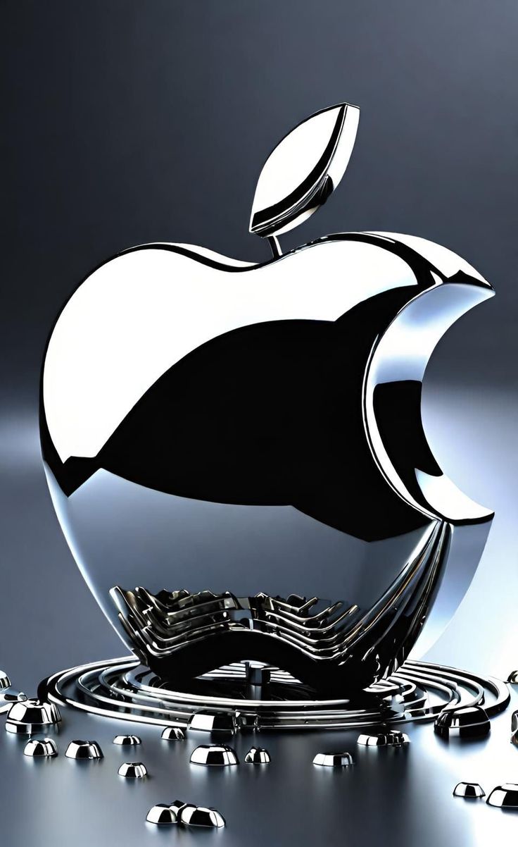 an apple logo is shown on top of some silver objects