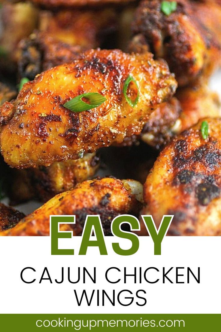 easy cajun chicken wings with herbs on top and the words easy cajun chicken wings above it