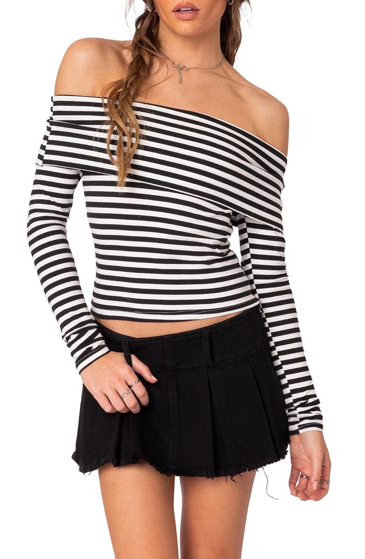 Allover stripes enliven this close-fitting top designed in a cropped, shoulder-baring silhouette with a folded neckline. Off-the-shoulder neck Long sleeves 95% cotton, 5% spandex Machine wash, dry flat Imported Fitted Black Top With Contrast Stripes, Black Fitted Top With Contrast Stripes, Striped Off-shoulder Top For Spring, Chic Fitted Striped Tops, Trendy Fitted Tops With Contrast Stripes, Chic Striped Cropped Top, Chic Striped Cropped Crop Top, Striped Fitted Tops For Fall, Fitted Spring Tops With Contrast Stripes